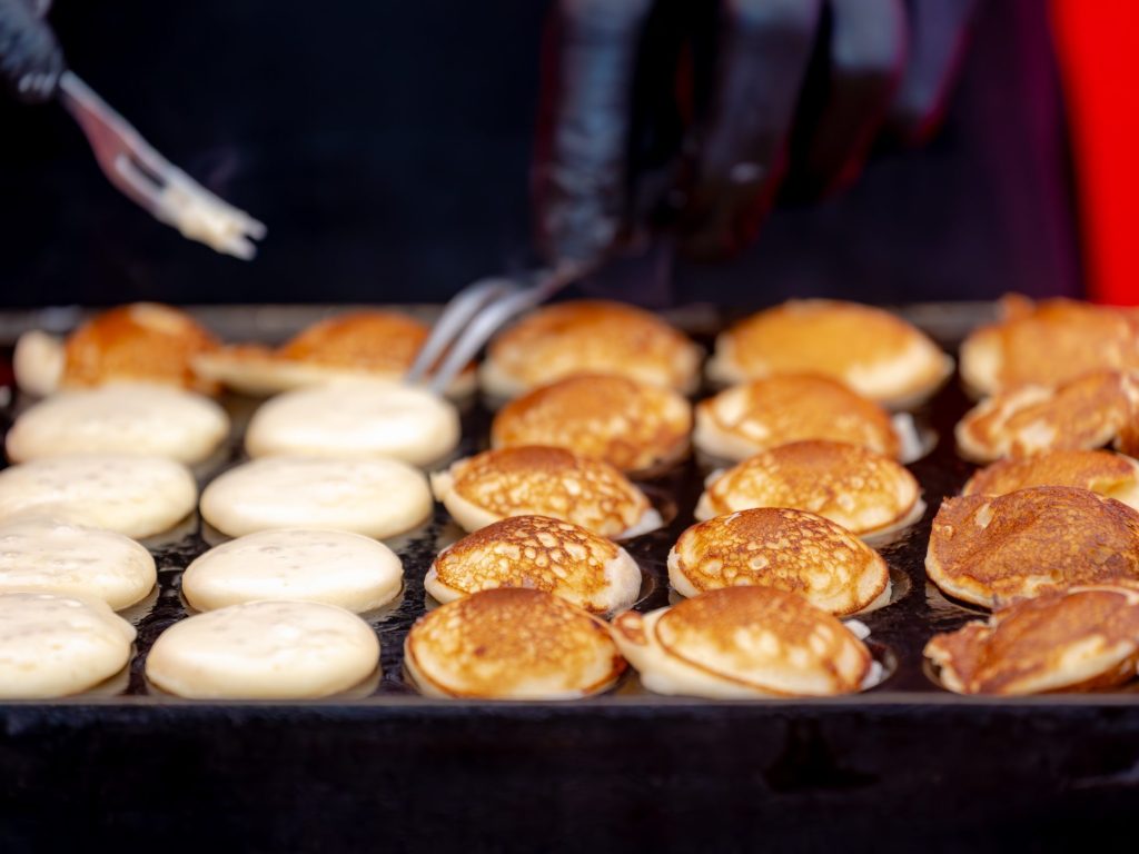 Making,Fresh,Poffertjes,In,Stove,Pan,On,Market,,Traditional,Dutch